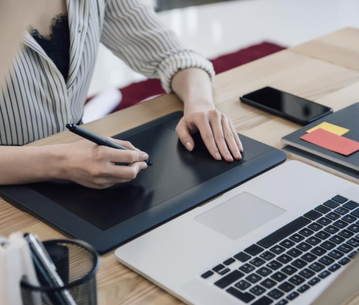 Woman on a tablet in an office location